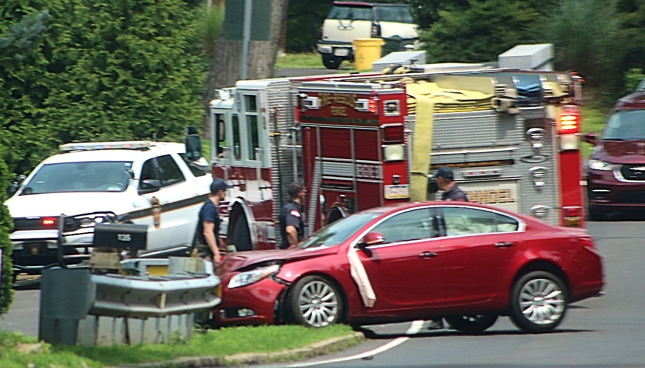 Woman Taken By Ambulance After Crash